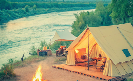 a-big-camp-set-up-next-to-a-river–the-camp-is-wel a-big-camp-set-up-next-to-a-river--the-camp-is-wel